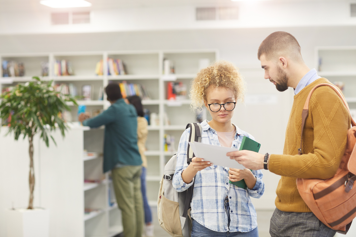 Two Students in School Library